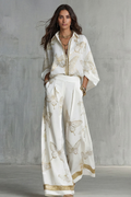 Two-Piece Set Women's Butterfly Print Blouse and Wide-Leg Pants with Gold Accents - Image 1