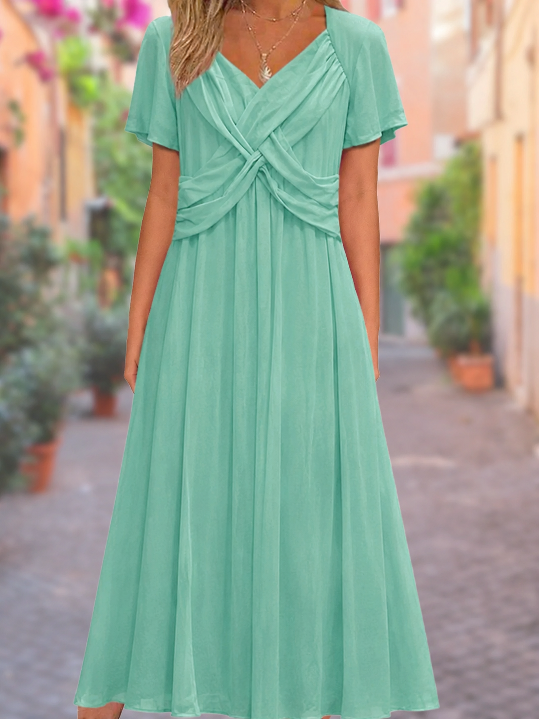 Emma – Dress with a V-neck and a covered midriff