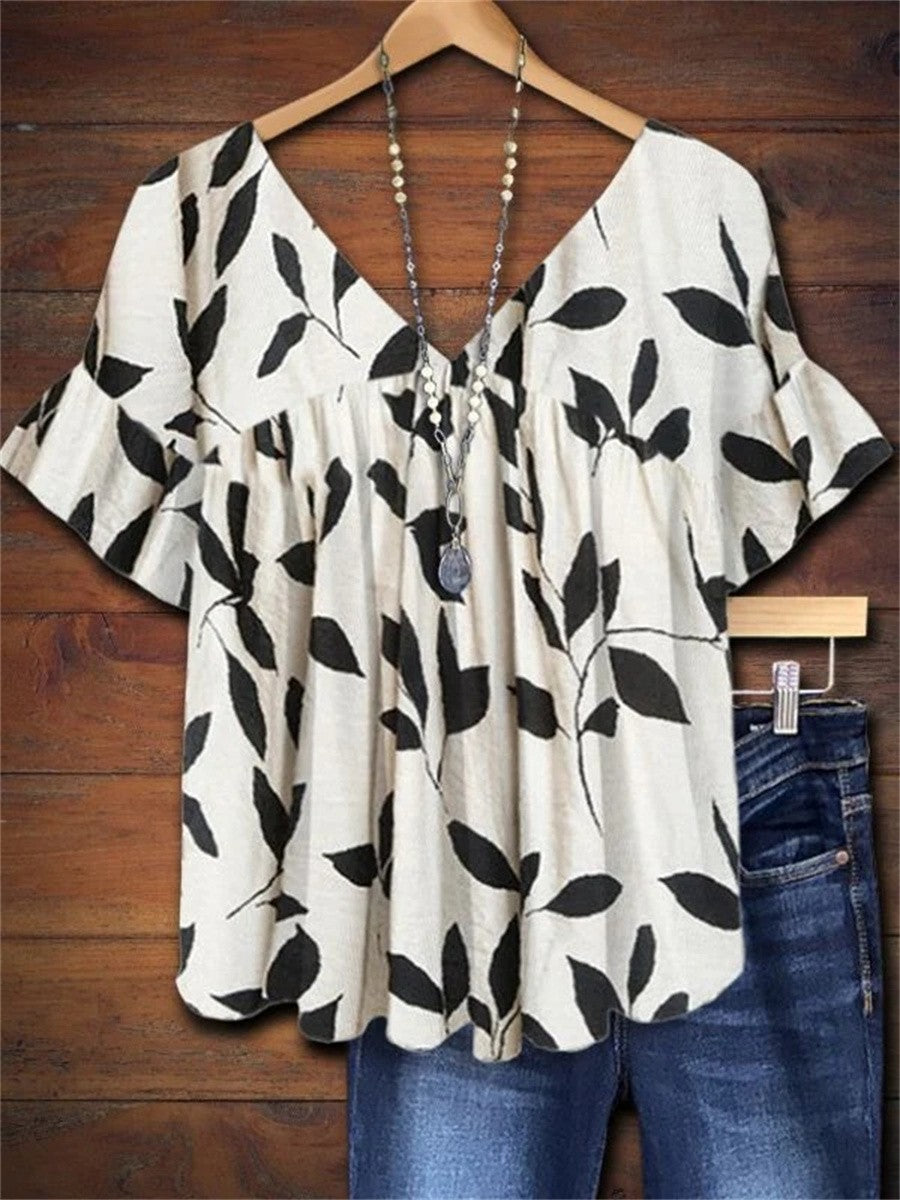Yvonne – Women’s Leaf Print V-Neck Ruffle Blouse - Image 1